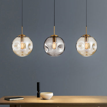 Suspension Thérèse en verre sphérique à fossettes