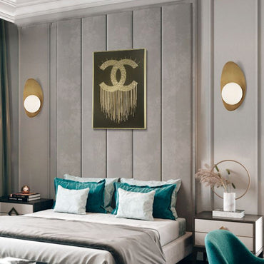 Aurélie Antique Brass Oval Wall Sconce with Glass Globe