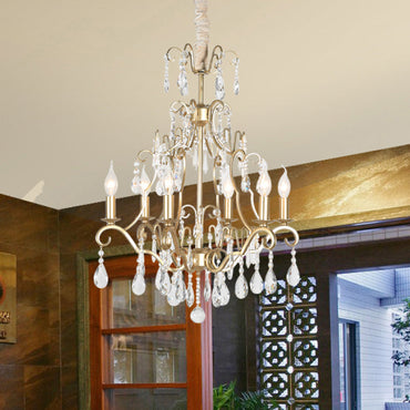 Lustre suspension Lucienne Gold à bras courbés et cristaux