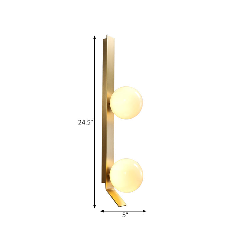 Applique murale double globe linéaire Clémence en laiton