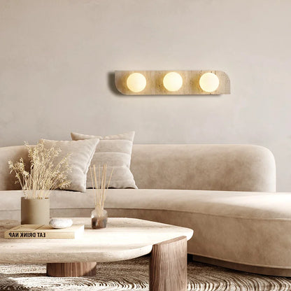 Élodie Arco Travertine LED Wall Sconce