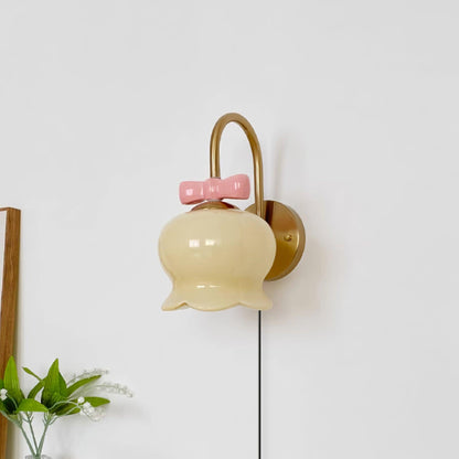 Applique murale à brancher Chloé Bell avec nœud décoratif