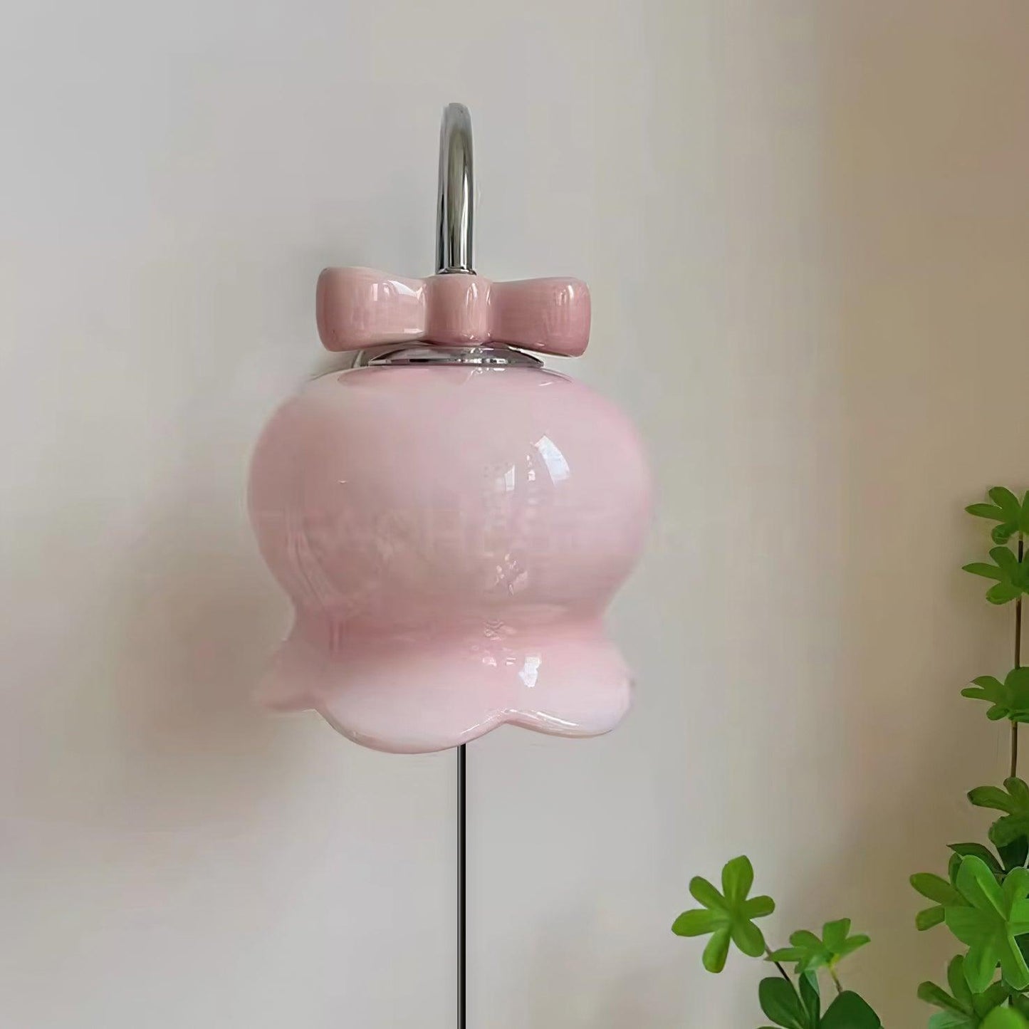 Applique murale à brancher Chloé Bell avec nœud décoratif