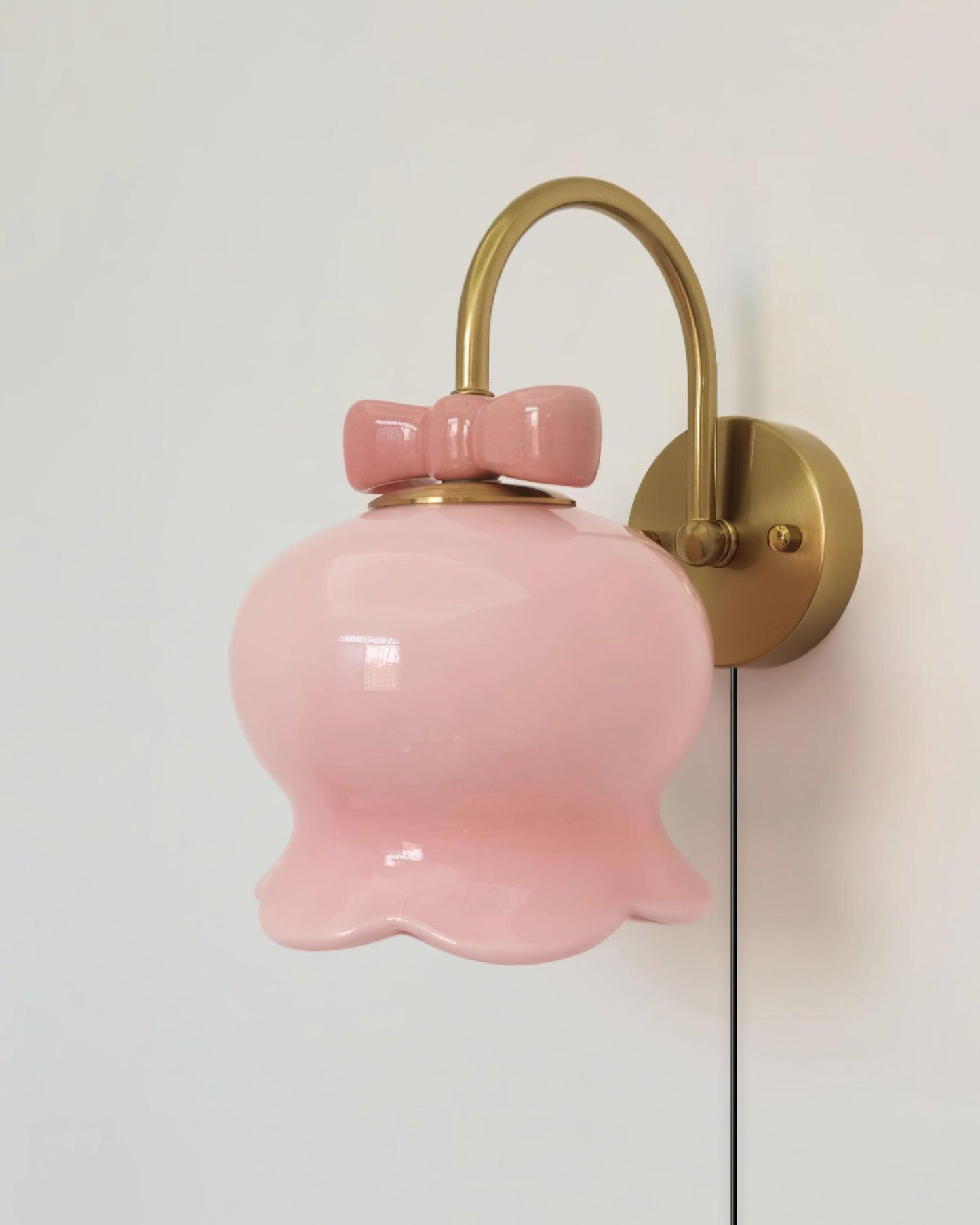 Applique murale à brancher Chloé Bell avec nœud décoratif