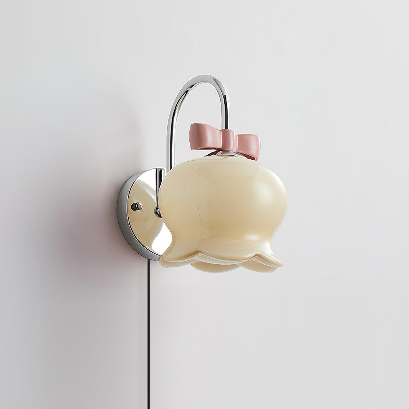 Applique murale à brancher Chloé Bell avec nœud décoratif