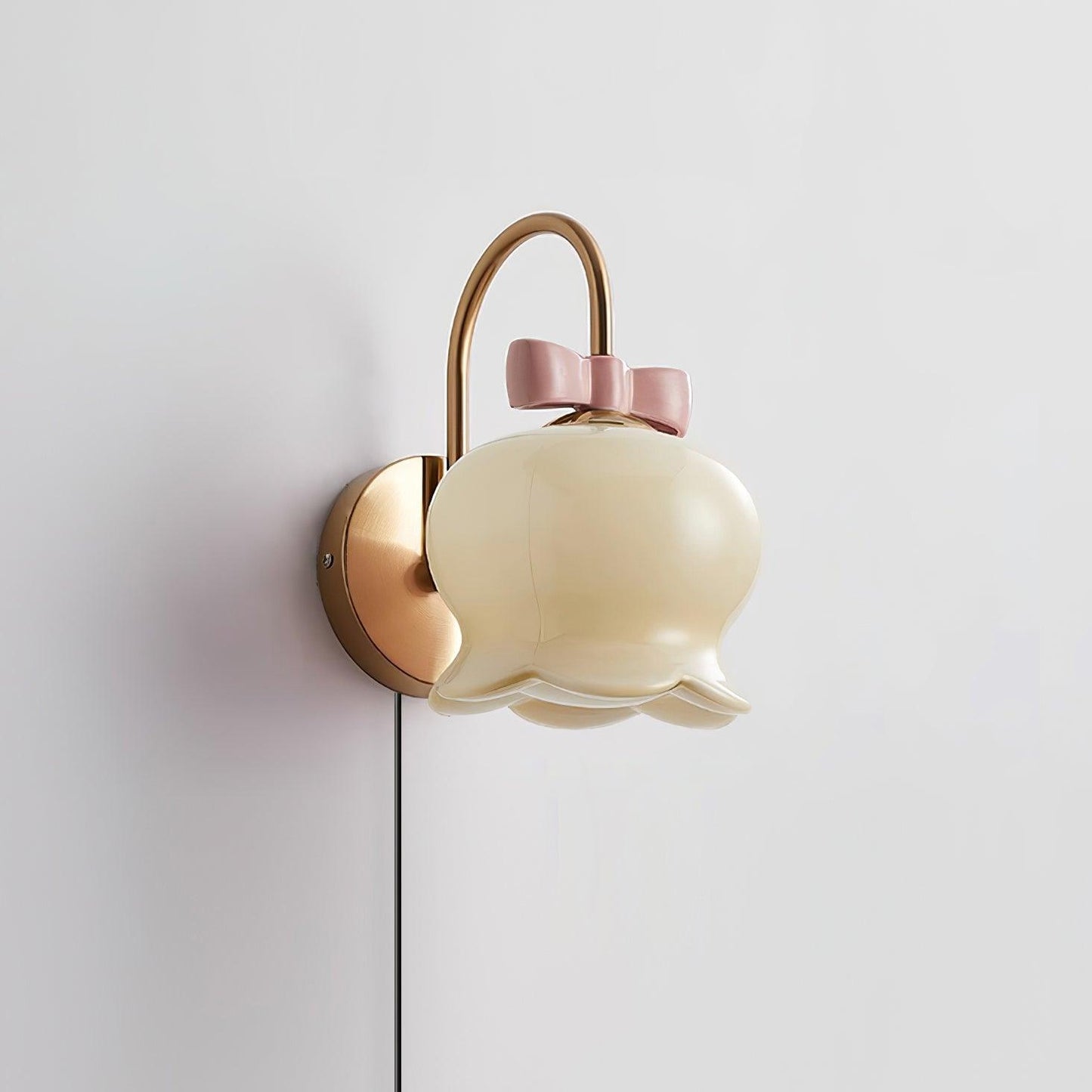 Applique murale à brancher Chloé Bell avec nœud décoratif