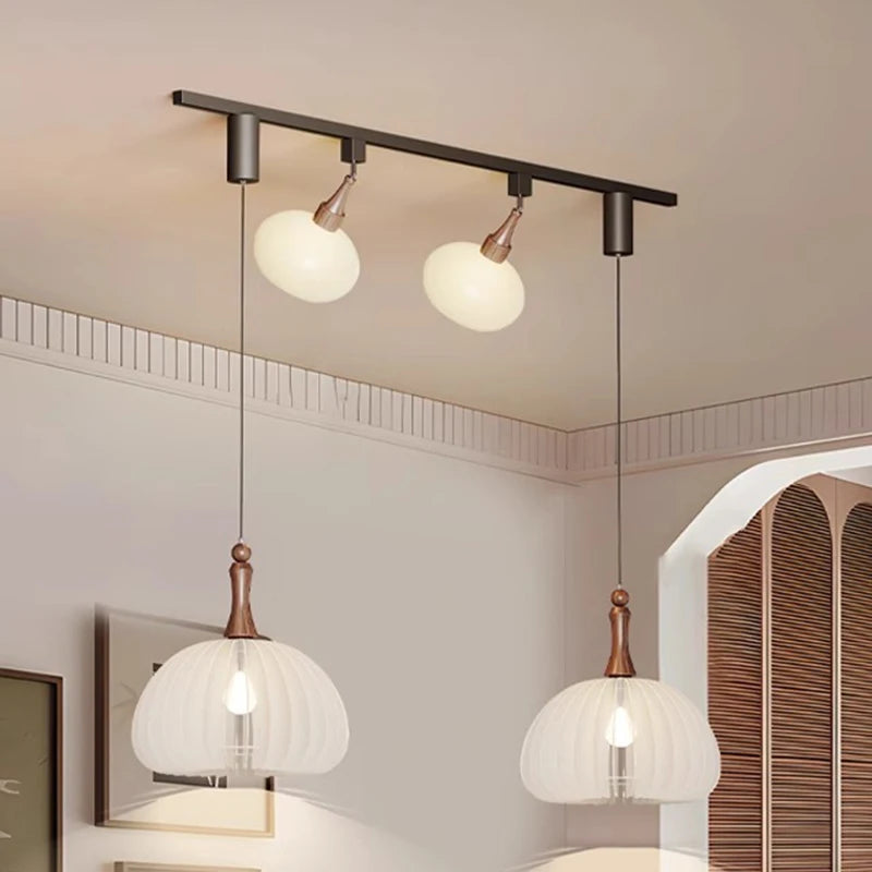 Lustre suspendu à plusieurs lampes en verre dépoli moderne Émile