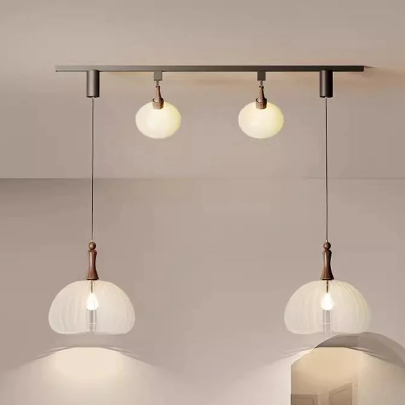 Lustre suspendu à plusieurs lampes en verre dépoli moderne Émile