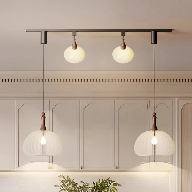 Lustre suspendu à plusieurs lampes en verre dépoli moderne Émile